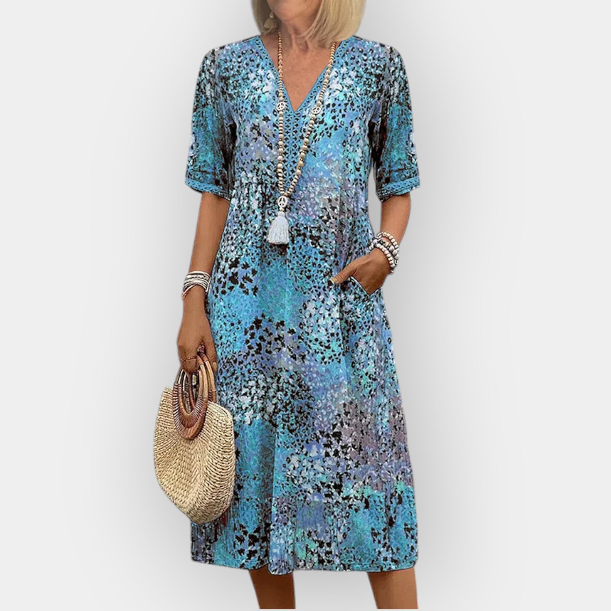 Rochie midi florală elegantă